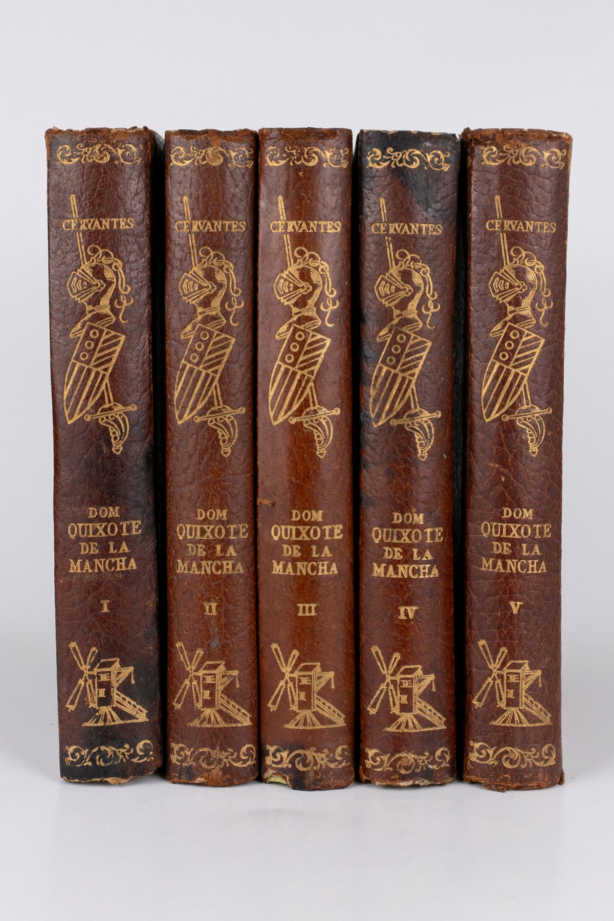 Dom Quixote de La Mancha (5 volumes) — MIGUEL DE CERVANTES (com marcas do tempo)